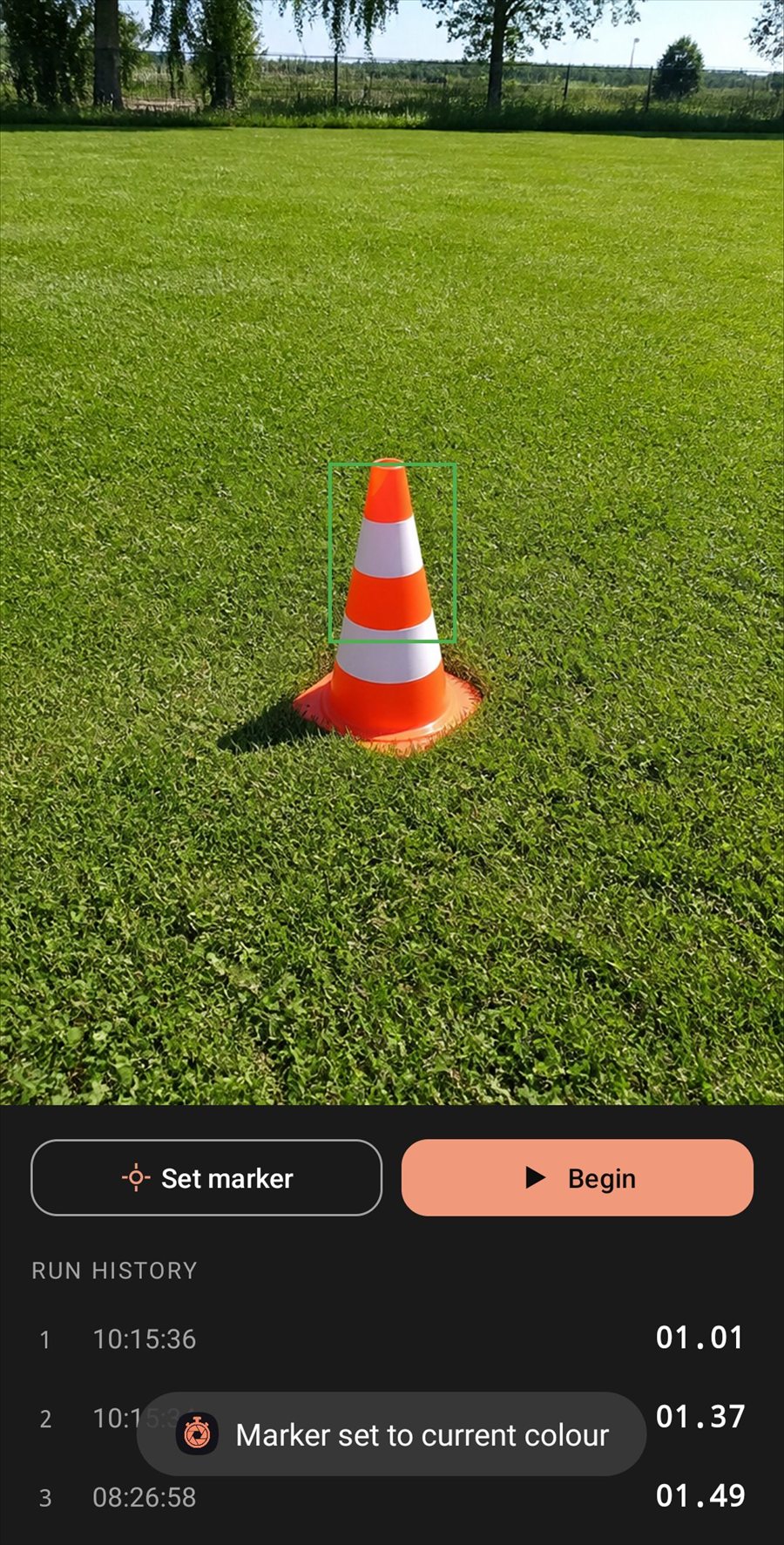 The guide box lined up over a marker cone, turned green